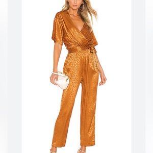 Joie gold jumpsuit. New without tags size S with cheetah print